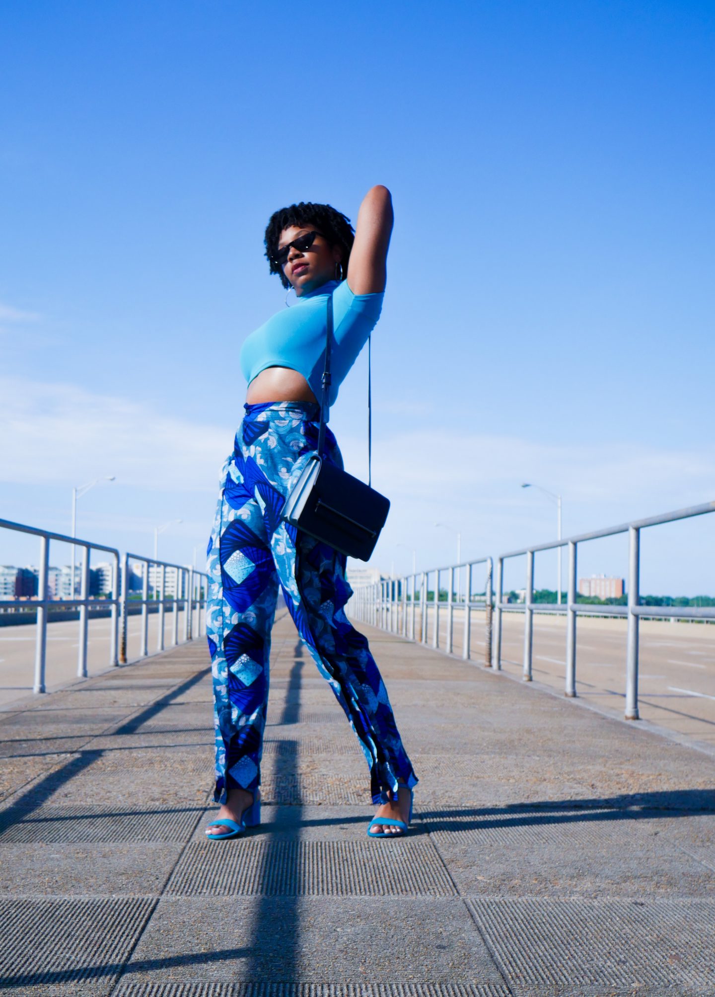 blogger posing on highway